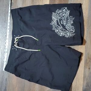 Tommy Bahama embroidered swordfish black white lined swim trunks